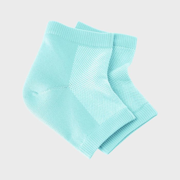 Two light blue socks overlap, displayed against a plain white background.