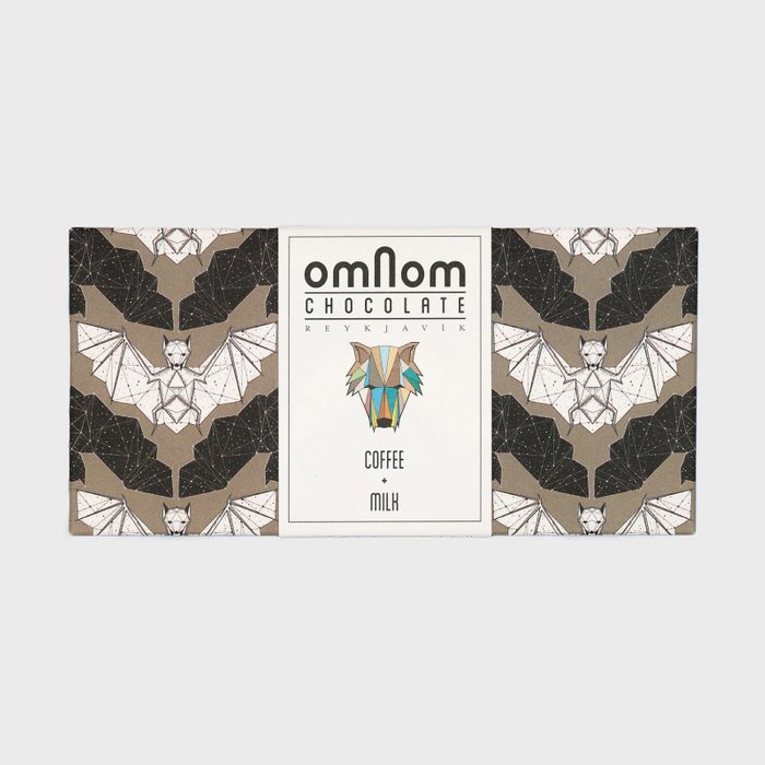 Chocolate bar packaging features geometric bat illustrations, centered text 