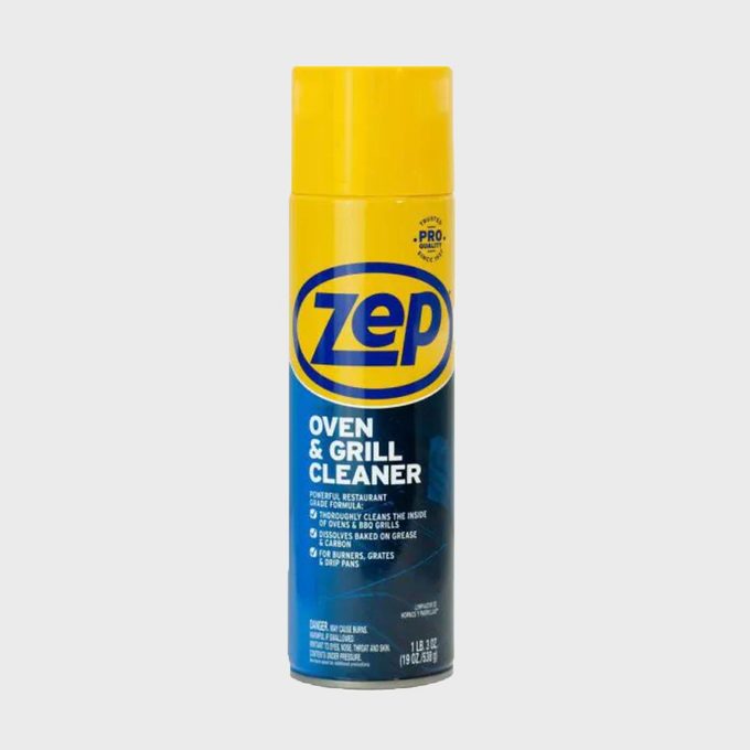 Aerosol can stands with a yellow cap and blue label in a white space, labeled 