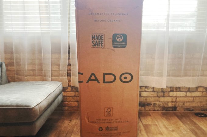 Box standing upright in a room, displaying 