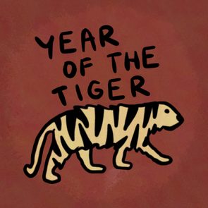 Stylized tiger walks with text 