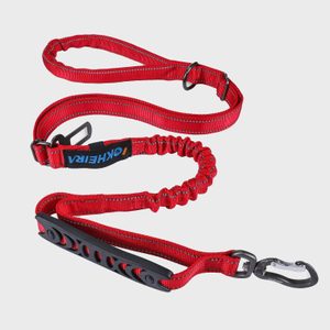 A red leash with multiple loops lies coiled. It features a metal clasp and a brand labeled 