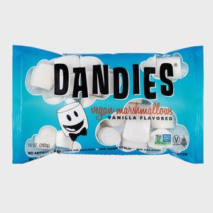 Bag of Dandies vegan marshmallows, featuring cartoon character, on bright blue background; labeled vanilla flavored, non-GMO, gluten-free, and vegan.