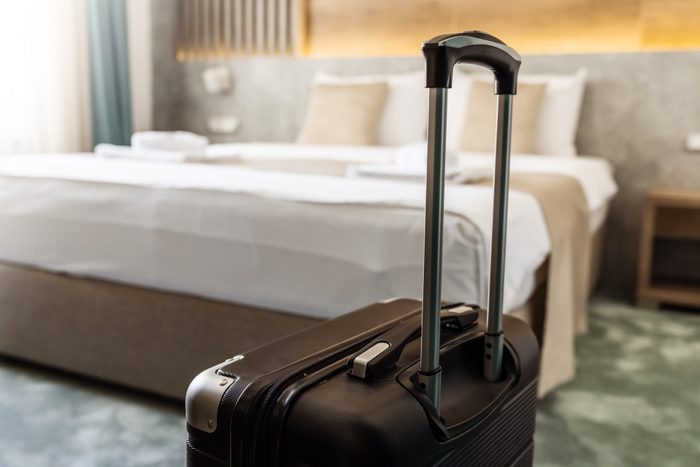 Suitcase in hotel room