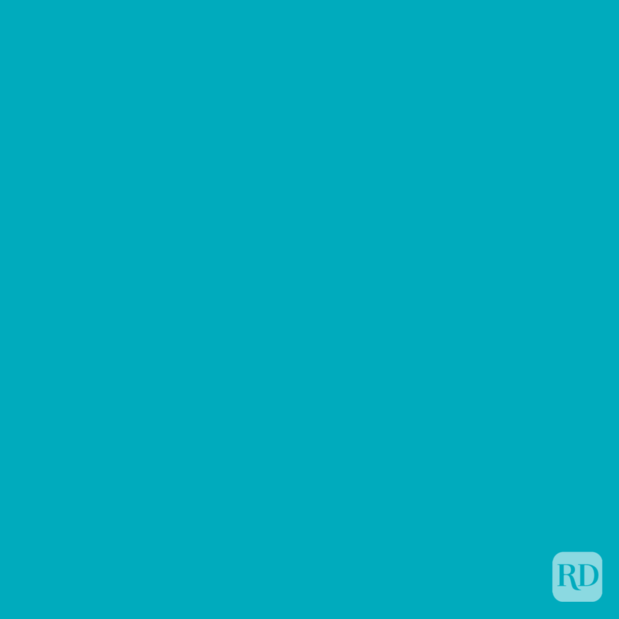 Solid teal background with a small, faint 