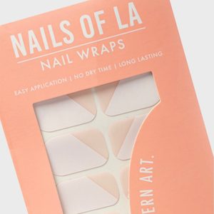 Nail wraps are displayed in a salmon pink package with text: 