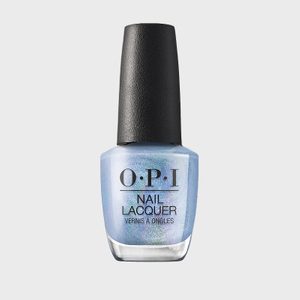 A bottle of shimmery blue nail lacquer sits against a plain white background, labeled 