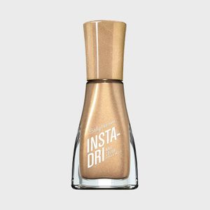 Nail polish bottle stands upright, featuring gold color and â€œSally Hansen Insta-Dri Nail Colorâ€ text, against a plain gray background.