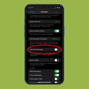 Smartphone displays message settings; 