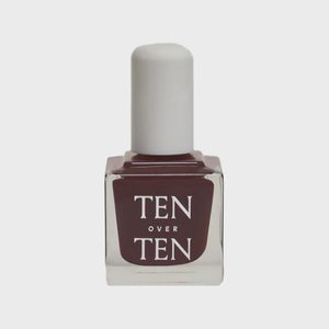 A square nail polish bottle shows 