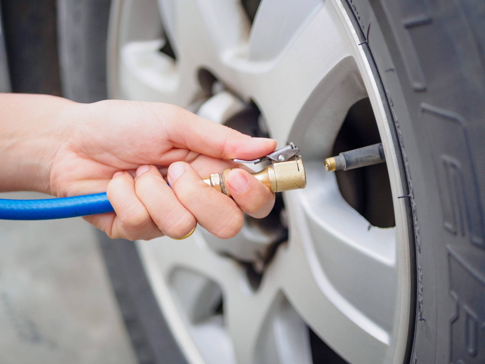 driver checking air pressure