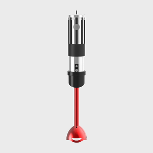 A sleek, metallic immersion blender stands vertically, featuring a red blending shaft and black handle, against a plain, light gray background.
