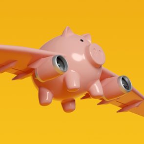 A pink pig-shaped airplane with engines flies against a bright yellow background.
