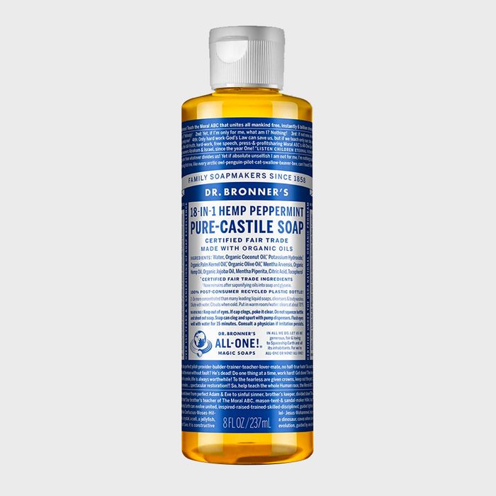 Bottle stands upright; contains Dr. Bronner's 18-in-1 Hemp Peppermint Pure-Castile Soap with blue label featuring product details. Text-filled label emphasizes organic ingredients.