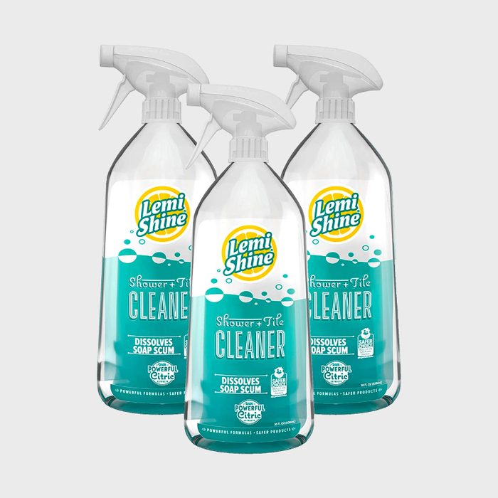 Bottles stand together, displaying Lemi Shine Shower + Tile Cleaner label with 