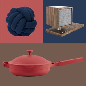 Knot pillow resting, nesting on a red background; wooden speaker positioned on a blue base; red pan placed, set against a brown backdrop.