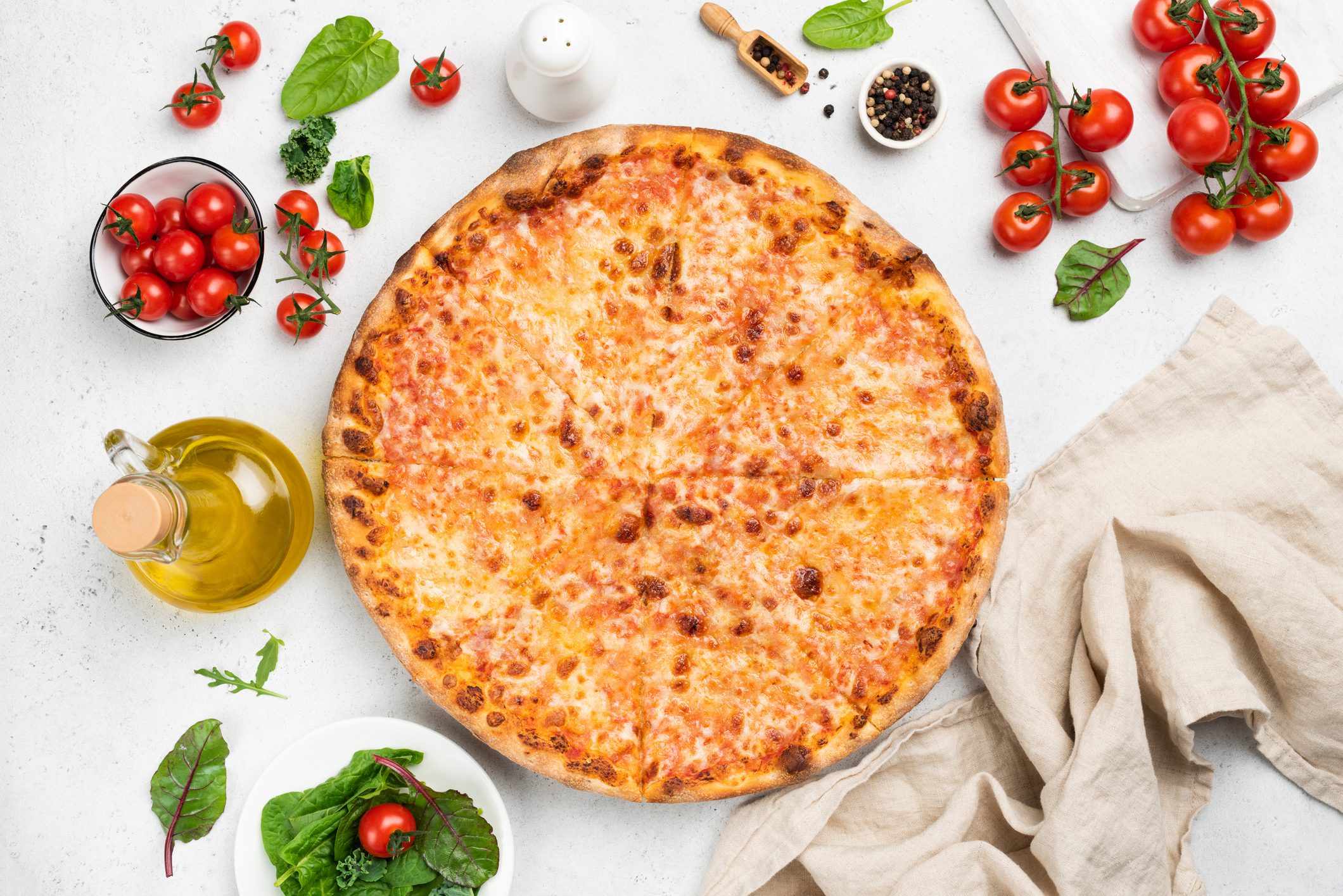 Tasty cheese pizza on white background top view