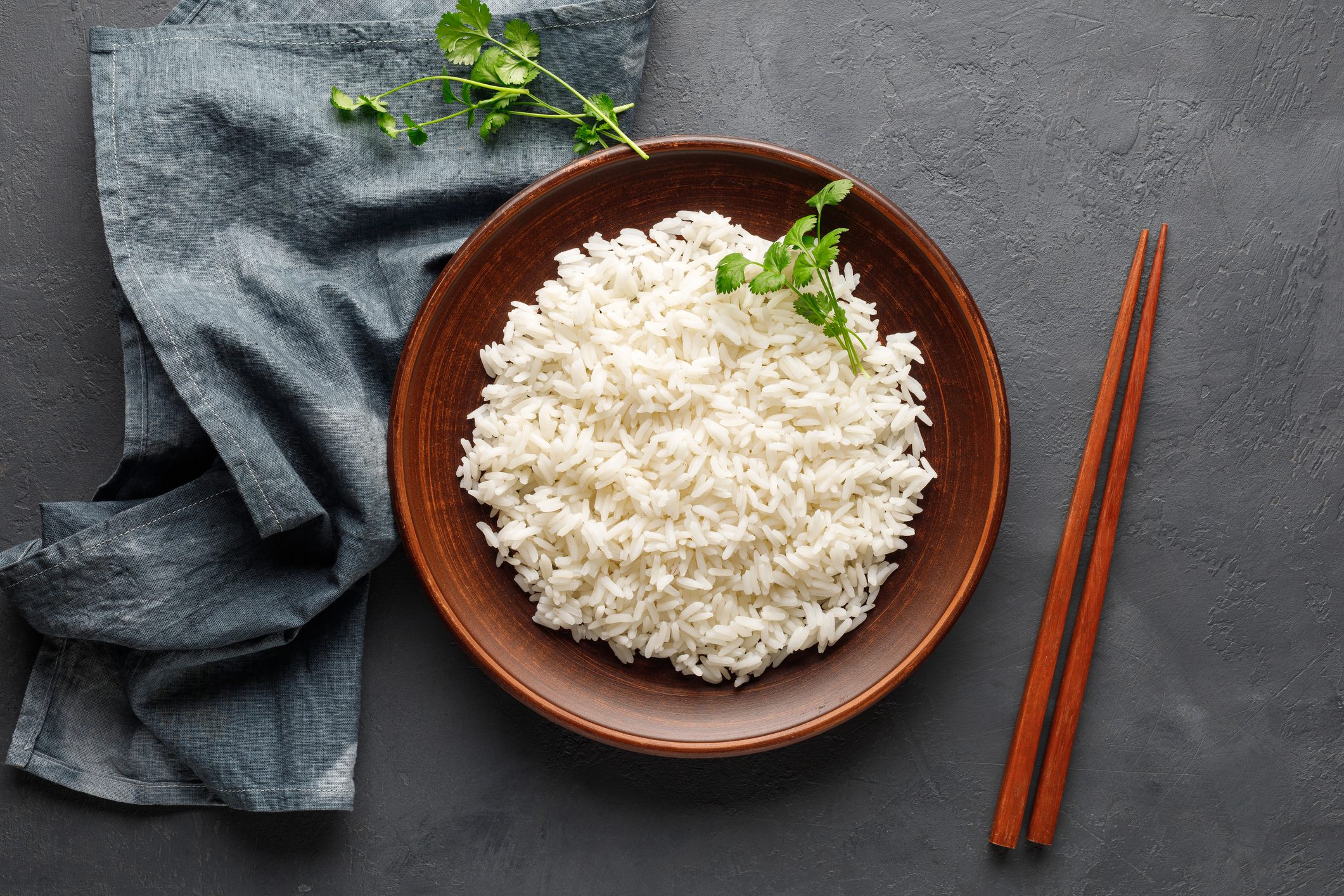 white rice in a brown plate