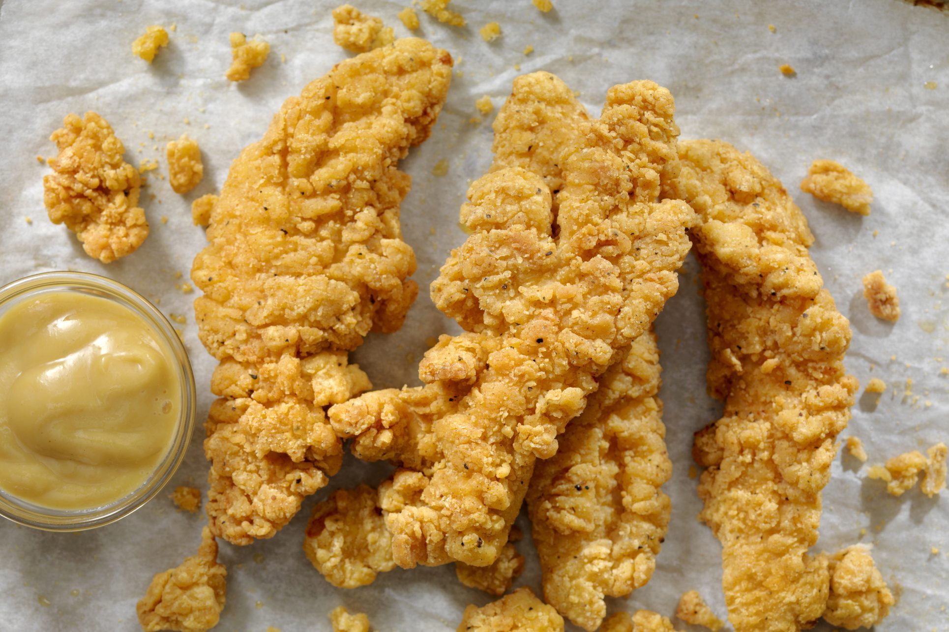 Crispy Chicken tenders with a side of honey mustard