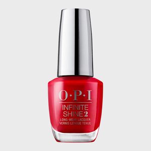 A red nail polish bottle stands upright, featuring 