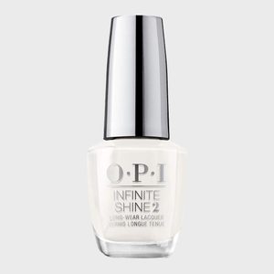 Nail polish bottle stands upright, silver cap reflecting light, against a plain background. Text reads: 