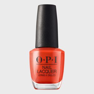 A bottle displays orange nail lacquer with a black cap, labeled 