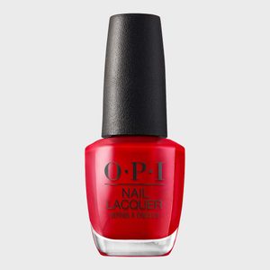 Nail polish bottle stands upright, displaying bright red color, against a plain gray background. Text reads: 