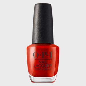 A red nail polish bottle stands upright, featuring the text 