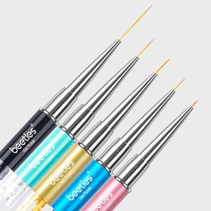 Nail art brushes have metallic handles, displaying fine tips; arranged in a gradient of black, blue, gold, teal, and pink against white.