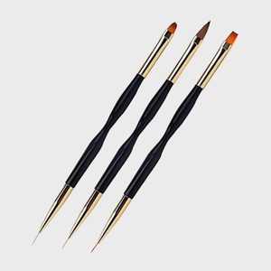 Three black-handled nail art brushes have different golden ferrules and brush tips, lying side by side on a plain, light gray background.