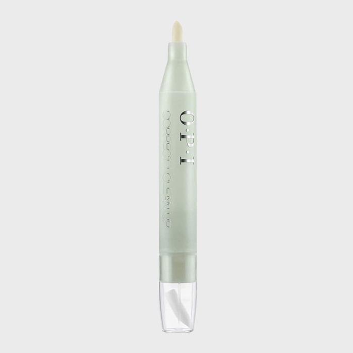 Silver pen stands upright, labeled 