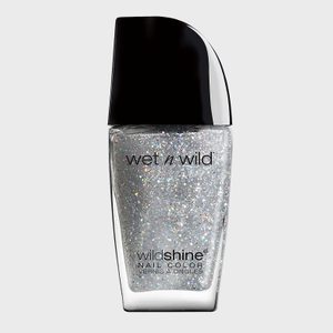 Glittery nail polish bottle, standing upright, with black cap. Text: â€œwet n wild wildshine Nail Color Vernis Ã  Ongles.â€ Set against a plain background.