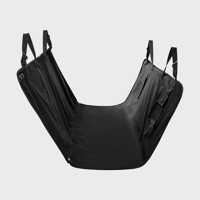 A black car seat cover is suspended with adjustable straps, designed to protect the backseat, against a plain white background.