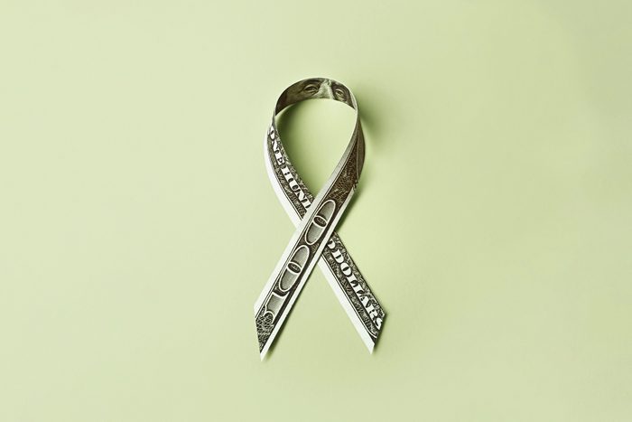 charity ribbon 100 dollar bill
