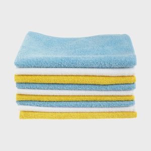 A stack of blue, white, and yellow microfiber cloths is neatly arranged on a plain white background.
