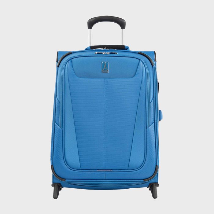 Blue suitcase with retractable handle stands upright, featuring wheels and a front pocket, on a plain white background.