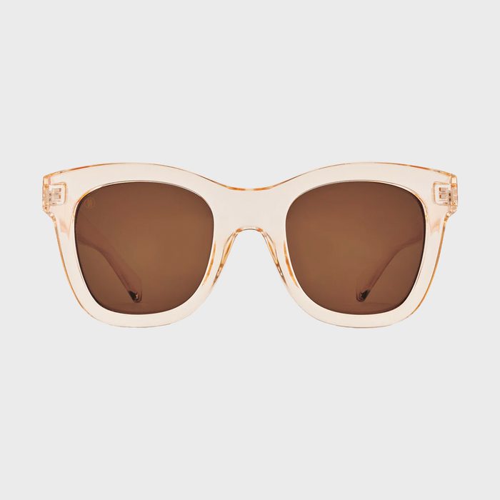 Translucent sunglasses with dark lenses are centered against a plain white background.