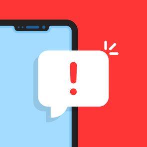 A smartphone displays an alert notification with an exclamation mark, set against a vibrant red background.