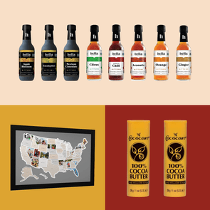 Bottles of bitters lined up, featuring various flavors. A map of the U.S. with photos is displayed and two yellow cocoa butter sticks stand vertically.