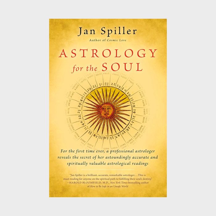 Book cover displays sun motif, surrounded by astrological symbols, with text 