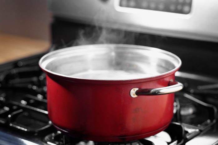 Pot of boiling water on stove top