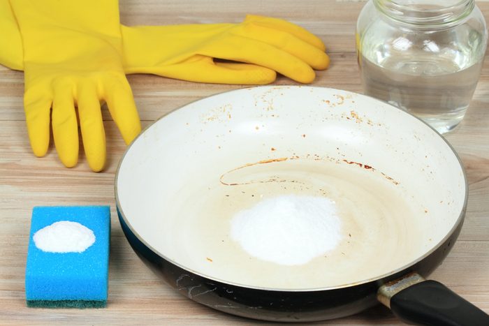 Eco friendly natural cleaners for burnt meal in a saucepan