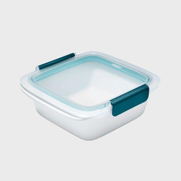 Square plastic food container with a transparent, sealable lid and teal handles, placed against a plain white background.