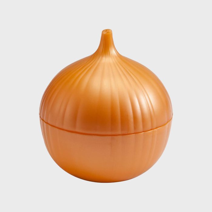 Orange onion-shaped container sits closed, displaying grooves and a glossy finish against a plain gray background.
