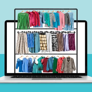 Laptop screen displays colorful clothing on hangers and racks, showing various tops and skirts in a minimalist, open layout.