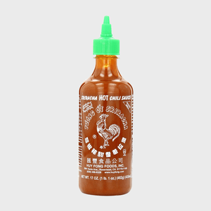 A bright red bottle labeled 