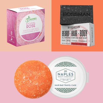 Three soap bar packages displayed: rose shampoo bar in pink box, charcoal beard/hair/body bar in black packaging, orange hair bar with travel case.