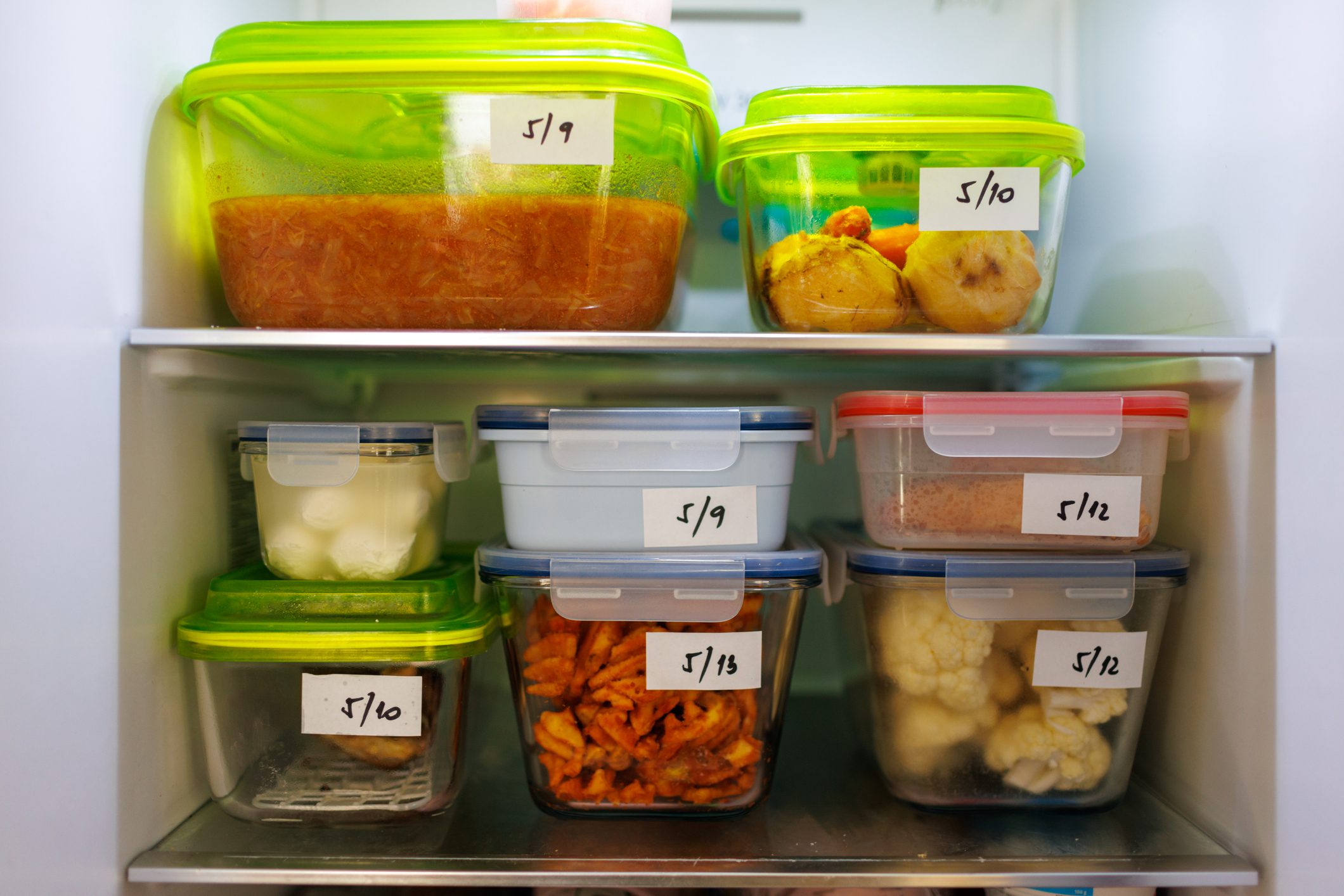 Food Leftovers Packaged In Boxes Inside A Home Fridge