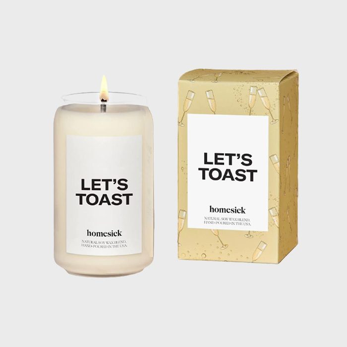A lit candle labeled 
