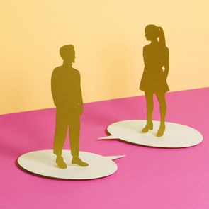 Silhouettes stand on speech bubbles, facing each other, set against a pink and yellow background, suggesting communication in a conceptual space.